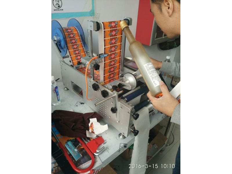 半自動不干膠瓶子貼標機